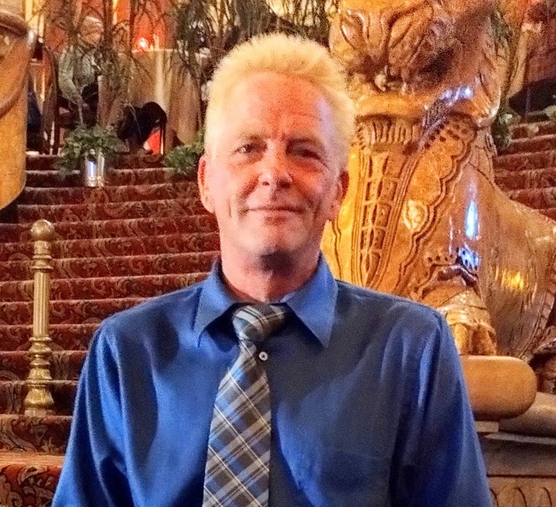 Todd Camp today, in a blue shirt and tie